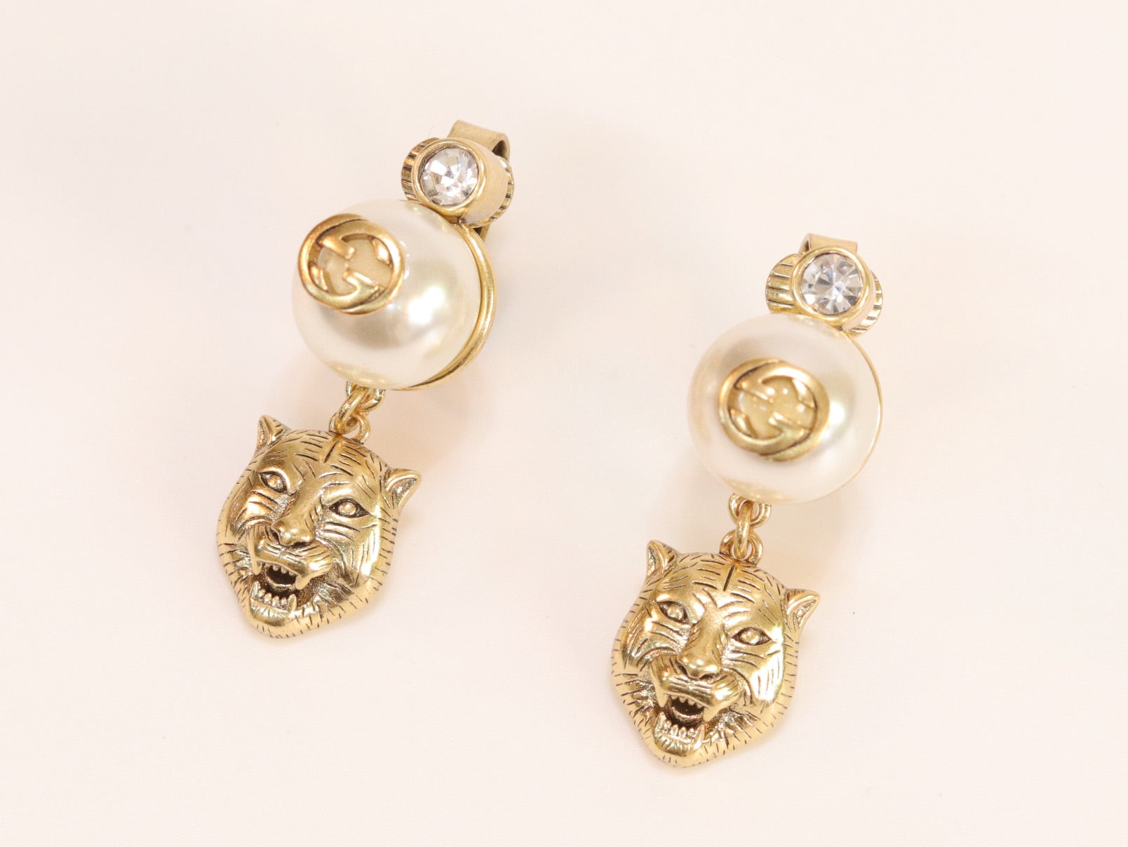 Double G panther pearl dangles in gold finish with CZ