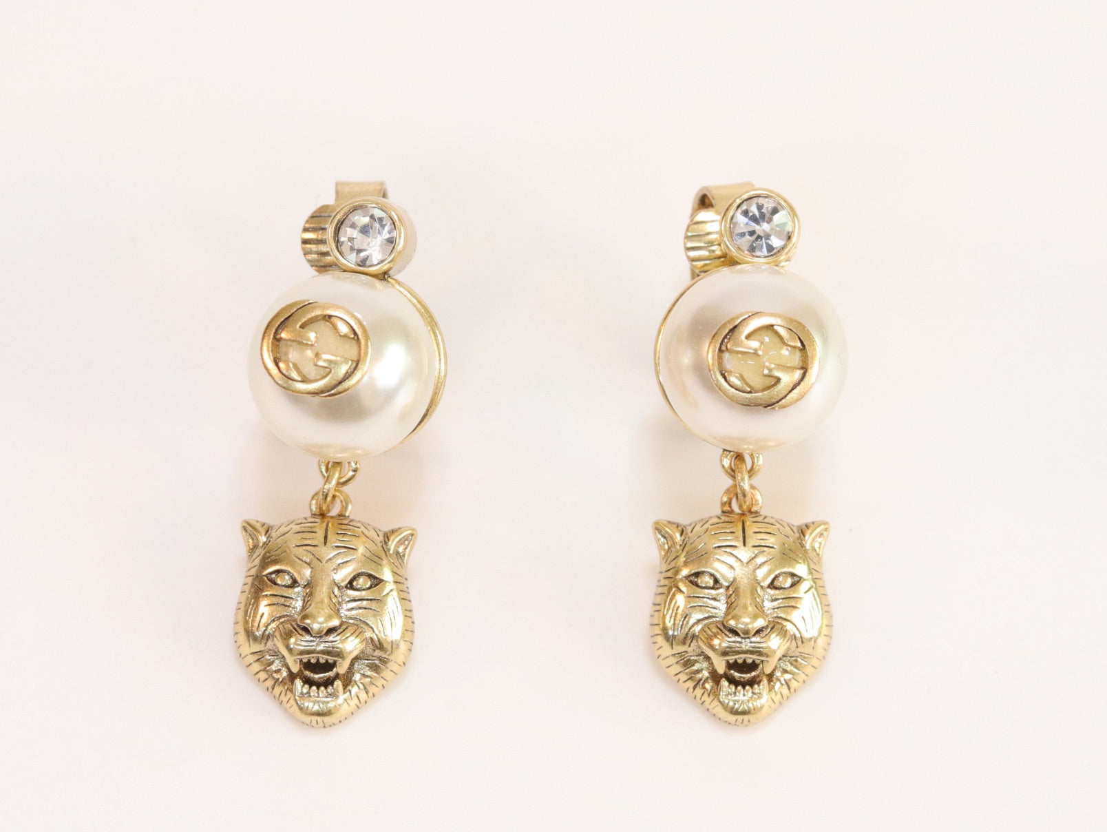 Double G panther pearl dangles in gold finish with CZ