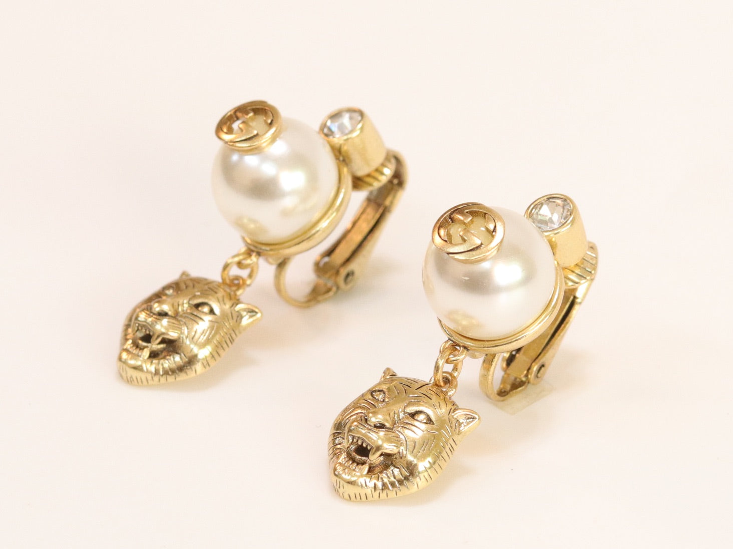 Double G panther pearl dangles in gold finish with CZ