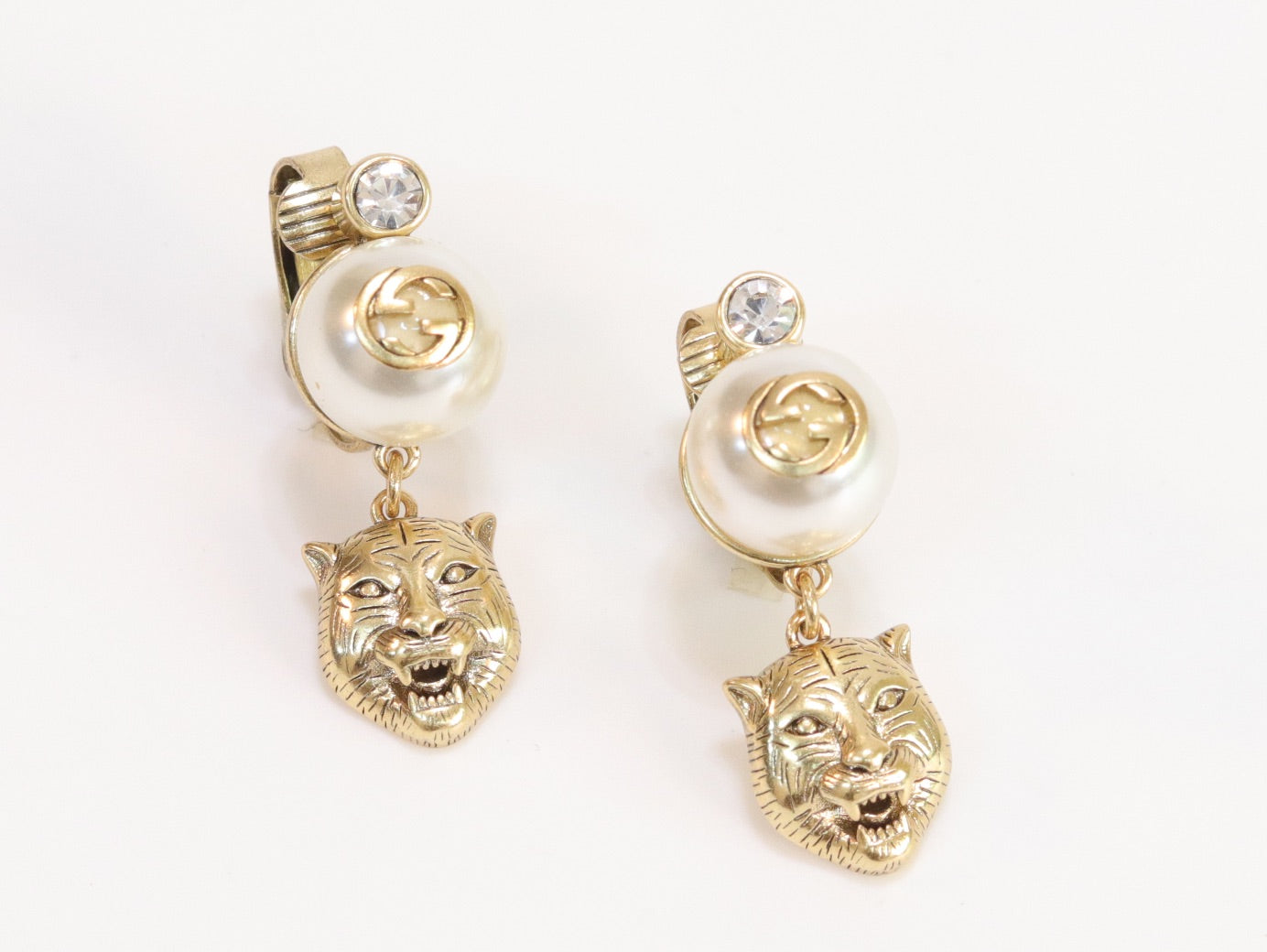 Double G panther pearl dangles in gold finish with CZ