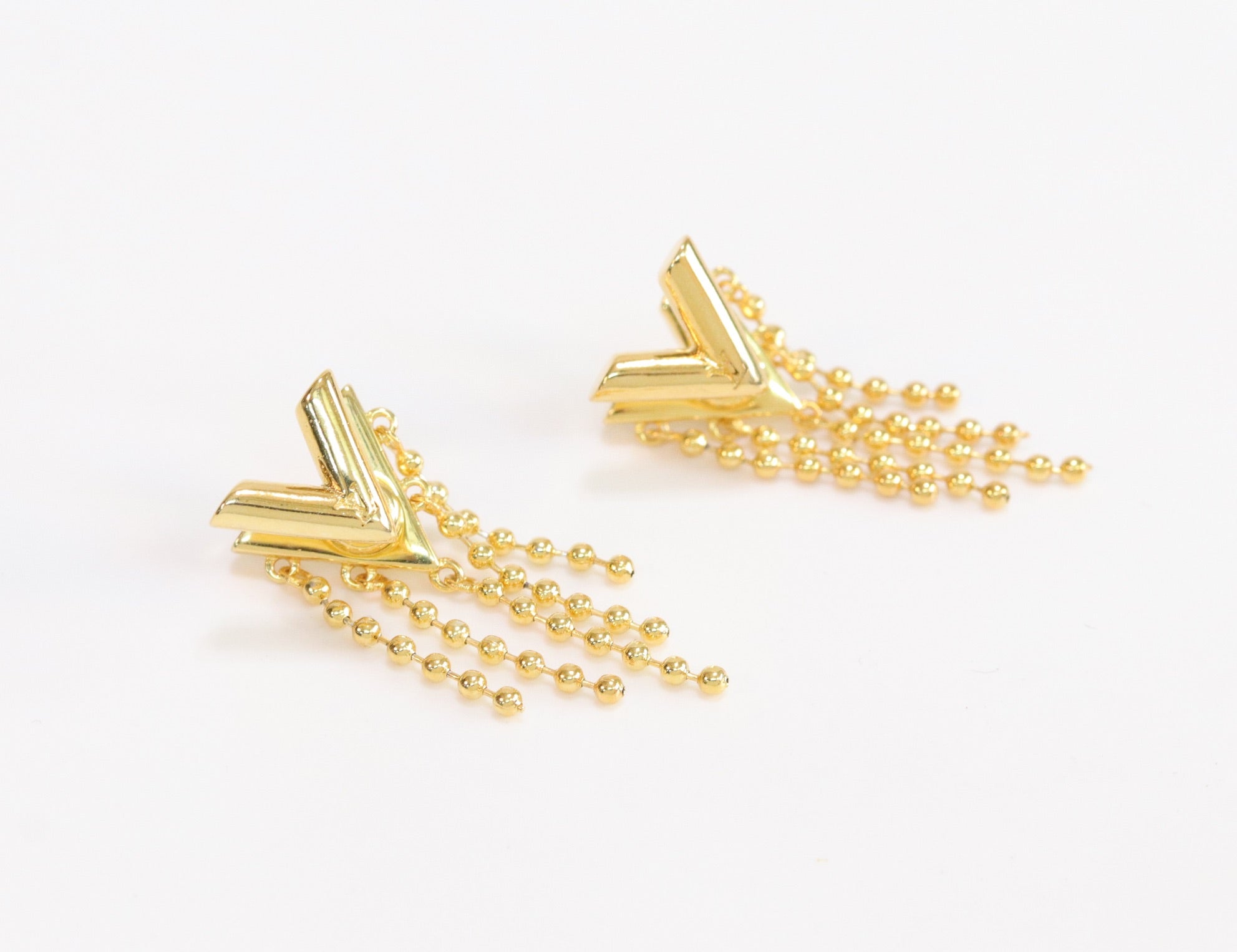 Alphabet v stud with dangles in gold finish