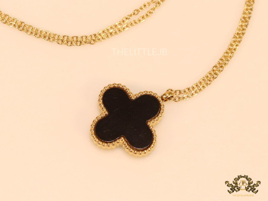 Gold plated chain with black onyx clover pendant
