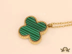 Gold plated chain with malachite stone clover pendant