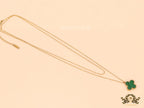 Gold plated chain with malachite stone clover pendant