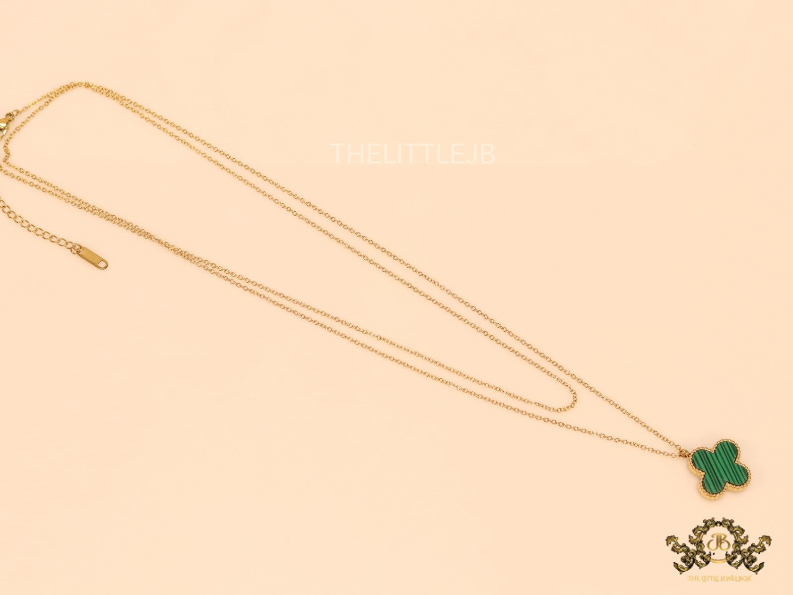 Gold plated chain with malachite stone clover pendant