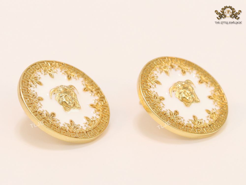 Medusa gold and white studs