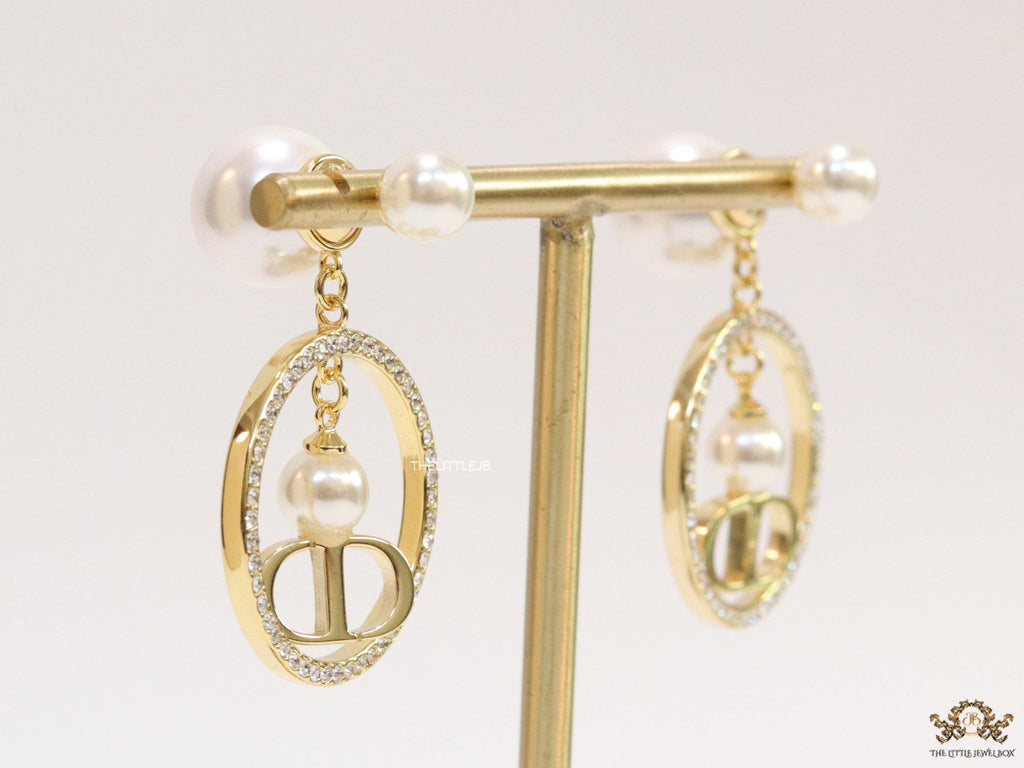 Golden cz round dangles with alphabets and pearl bomber pattern