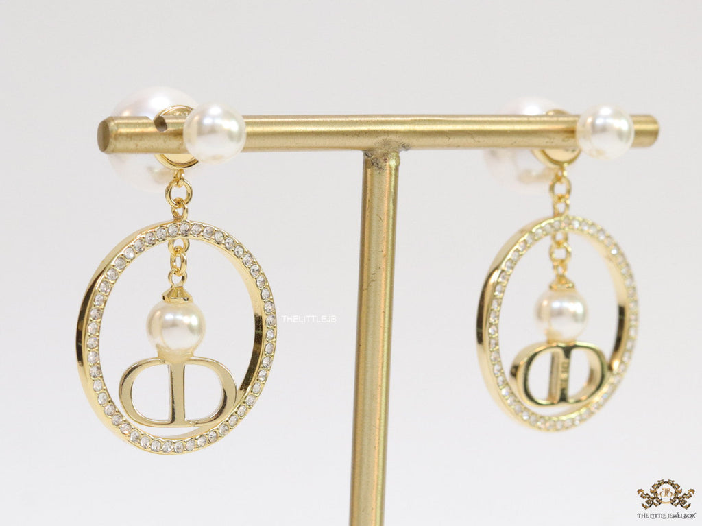 Golden cz round dangles with alphabets and pearl bomber pattern