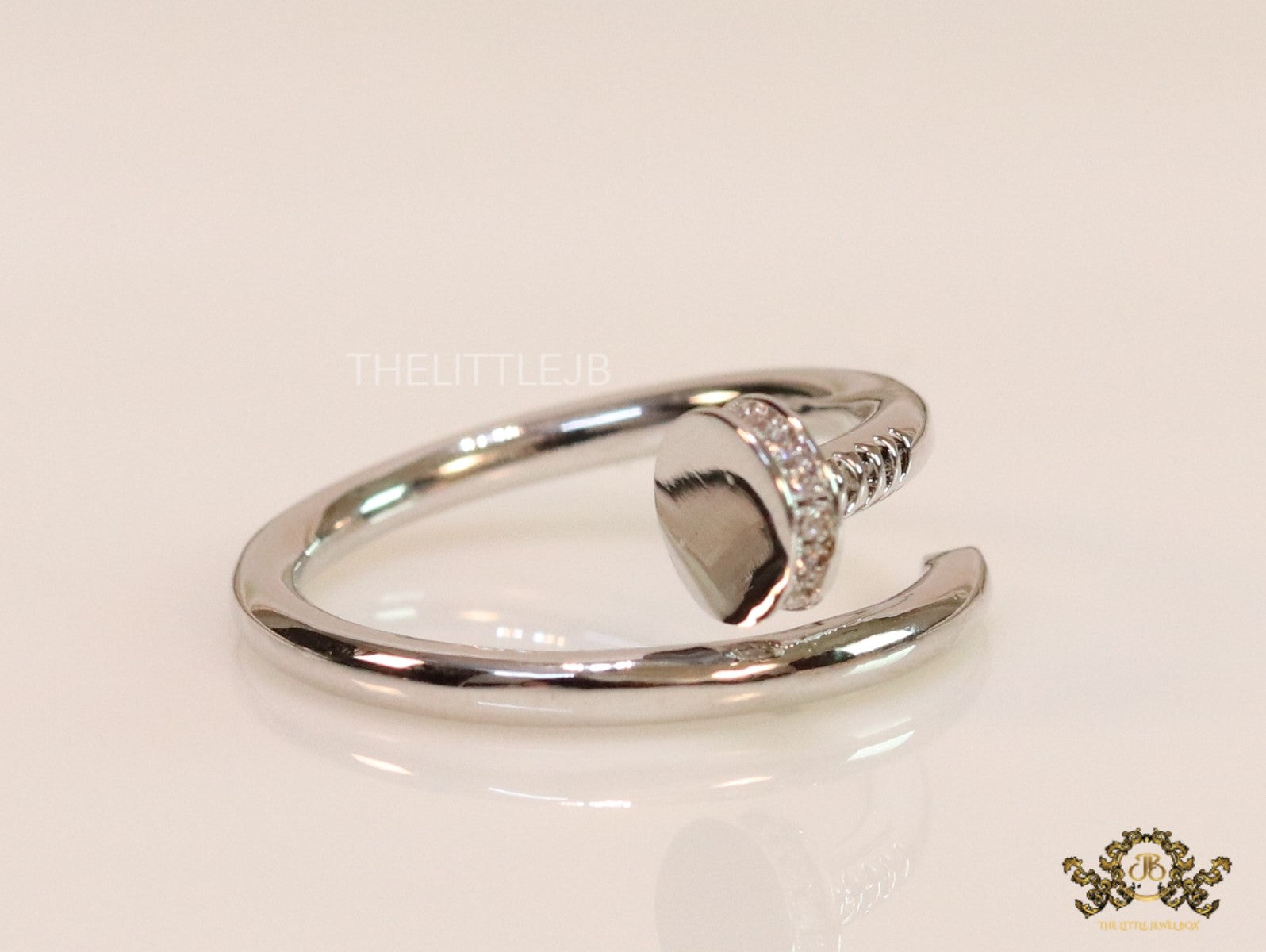 Platinum plated cz nail ring