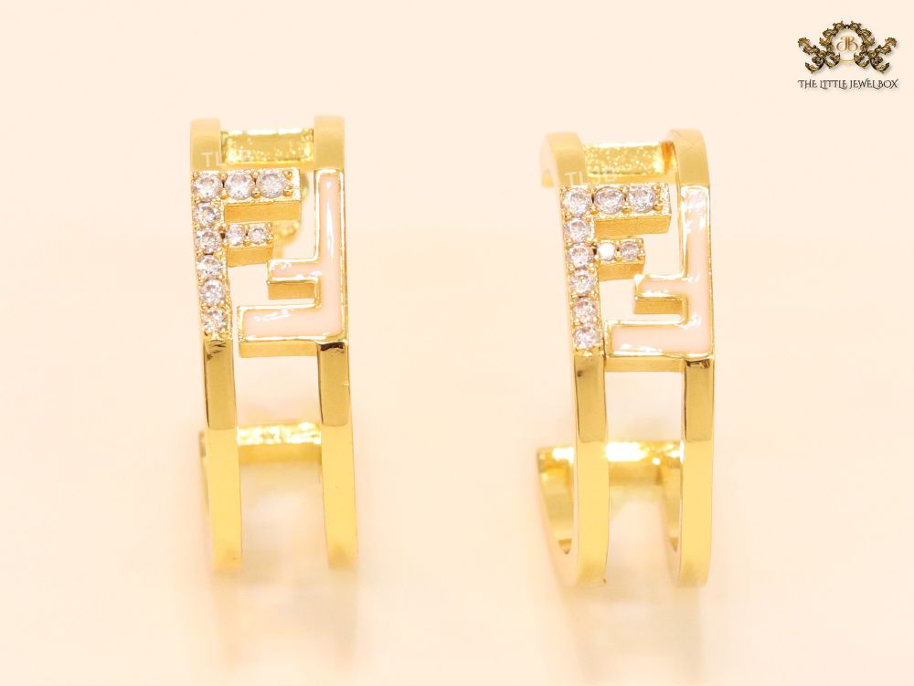 Double F Cz and gold studs