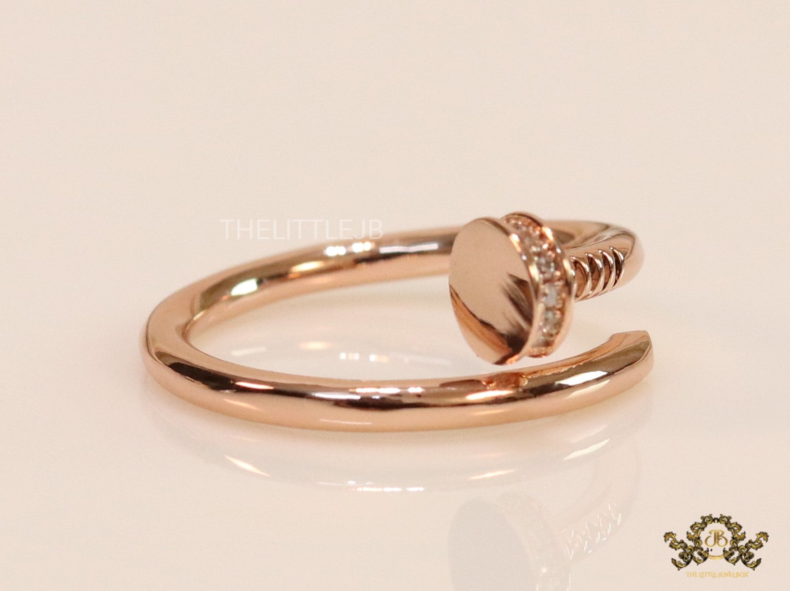 Rose gold plated cz nail ring