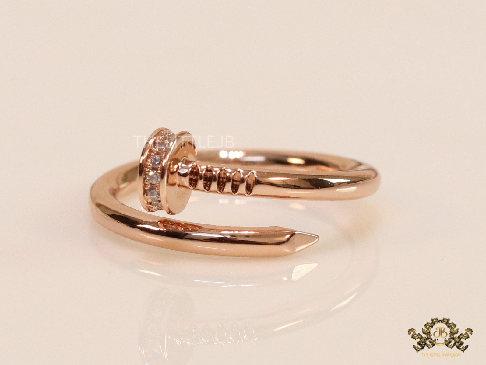 Rose gold plated cz nail ring