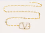 Open V and gold chain waist belt