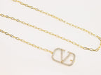 Open V and gold chain waist belt
