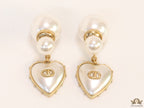 Gold plated pearl bomber earrings with MOP heart drop