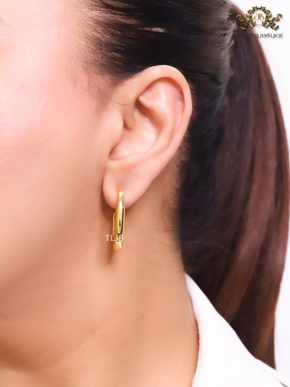 Small gold T & Co. hoops