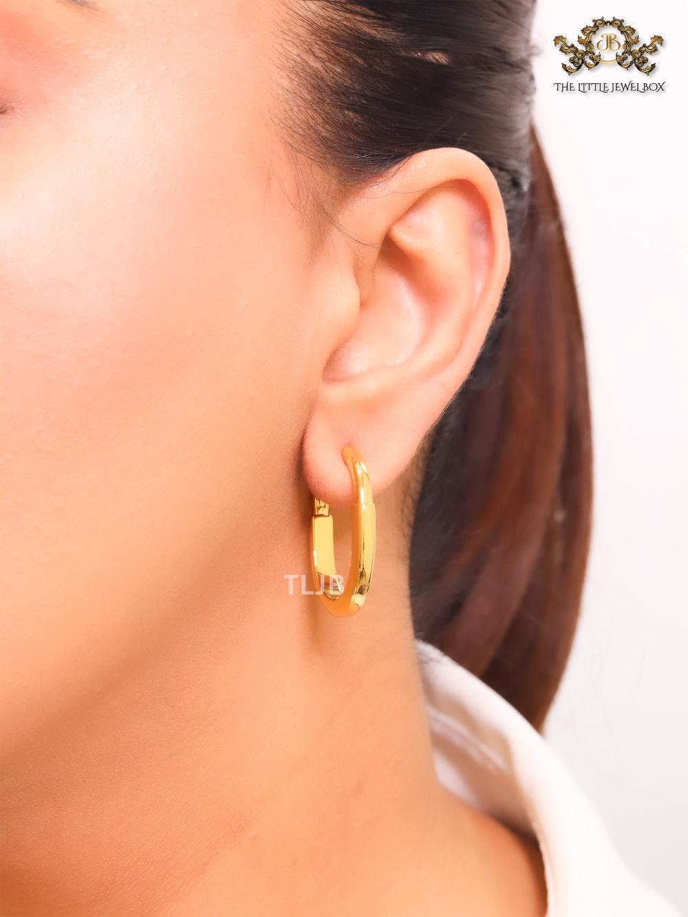 Small gold T & Co. hoops