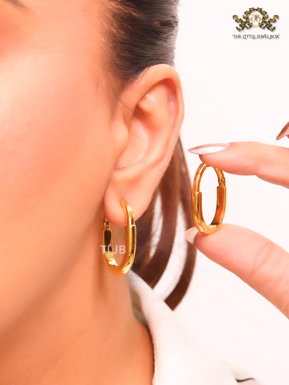 Small gold T & Co. hoops