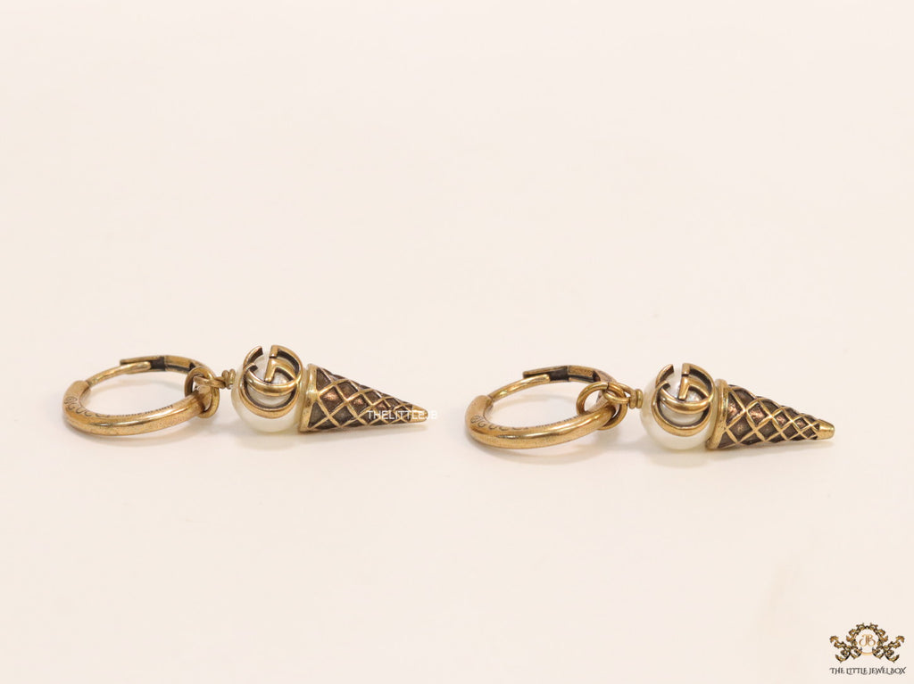 Small gold plated hoops with twin G and softy drops