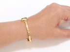 Alphabet LV Sleek bracelet in gold finish