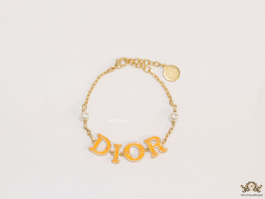 Alphabet bracelet with gold plated chain