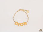 Alphabet bracelet with gold plated chain