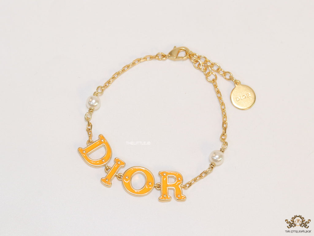Alphabet bracelet with gold plated chain
