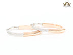 Alphabet T & Co. dual tone rose gold and cz oval hoops