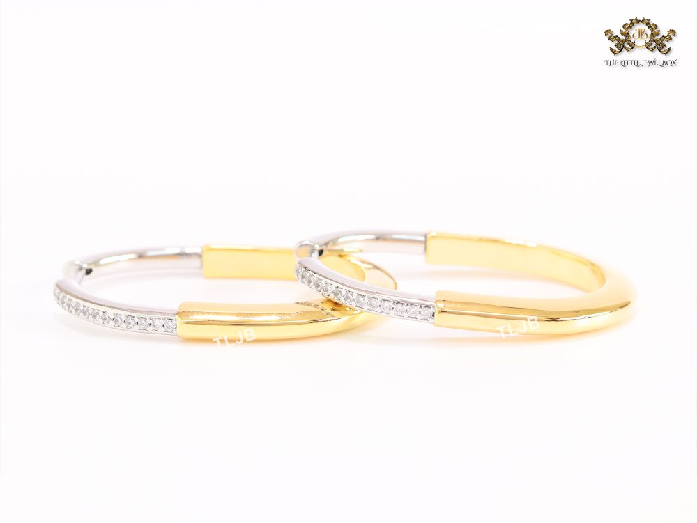 Alphabet T & Co. dual tone gold and cz oval hoops