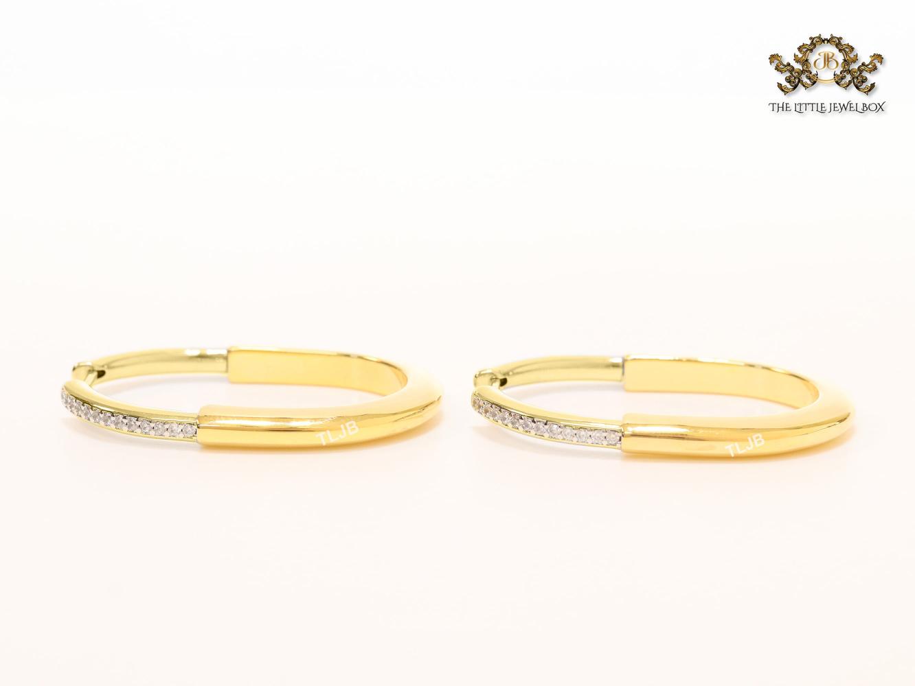 Alphabet T & Co. gold and cz oval hoops