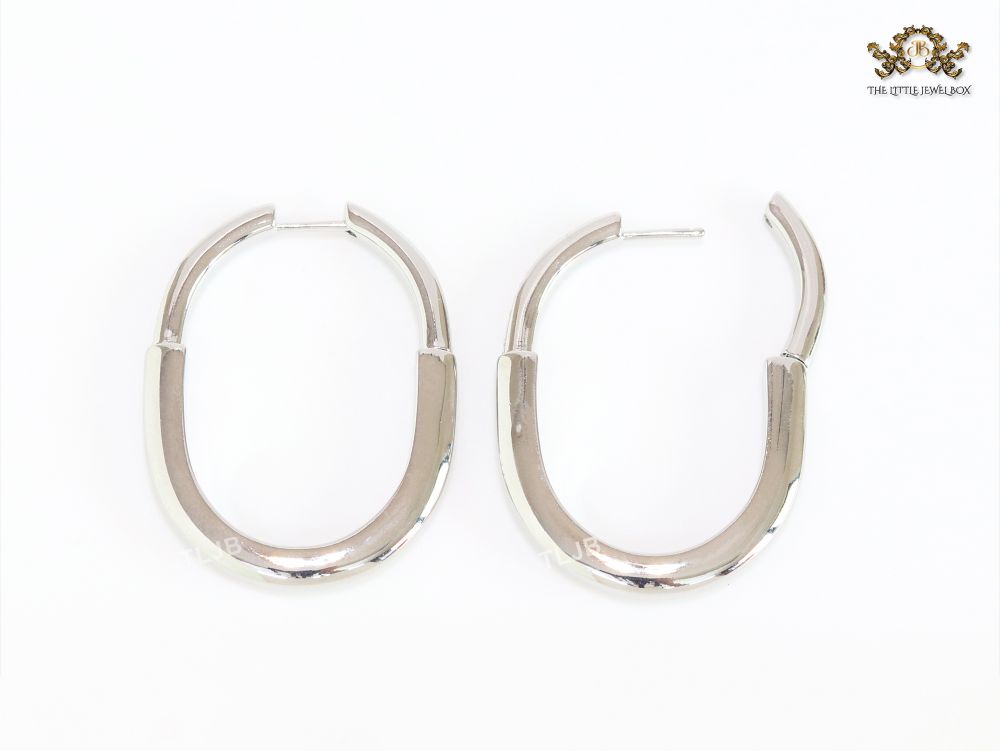 Alphabet T & Co. platinum and cz oval hoops