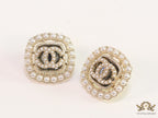 Pearl and cz studs with twin C motif