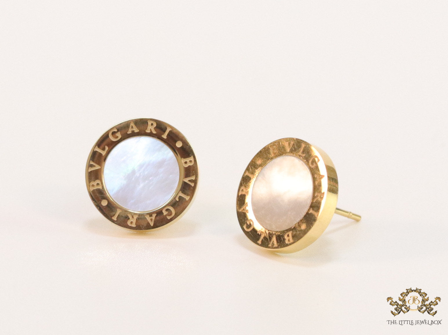 Alphabet inscribed golden stud earrings with MOP