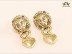 Antique lion face heart dangles