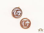 Rose gold plated twin G motif studs with MOP