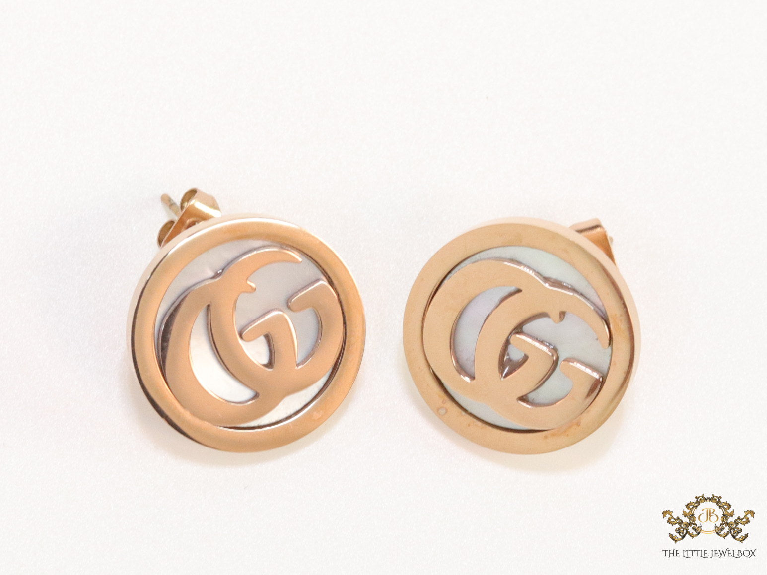 Rose gold plated twin G motif studs with MOP