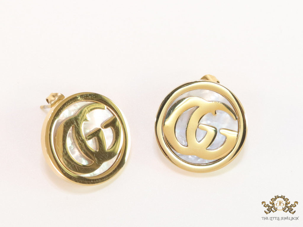 Gold plated twin G motif studs with MOP