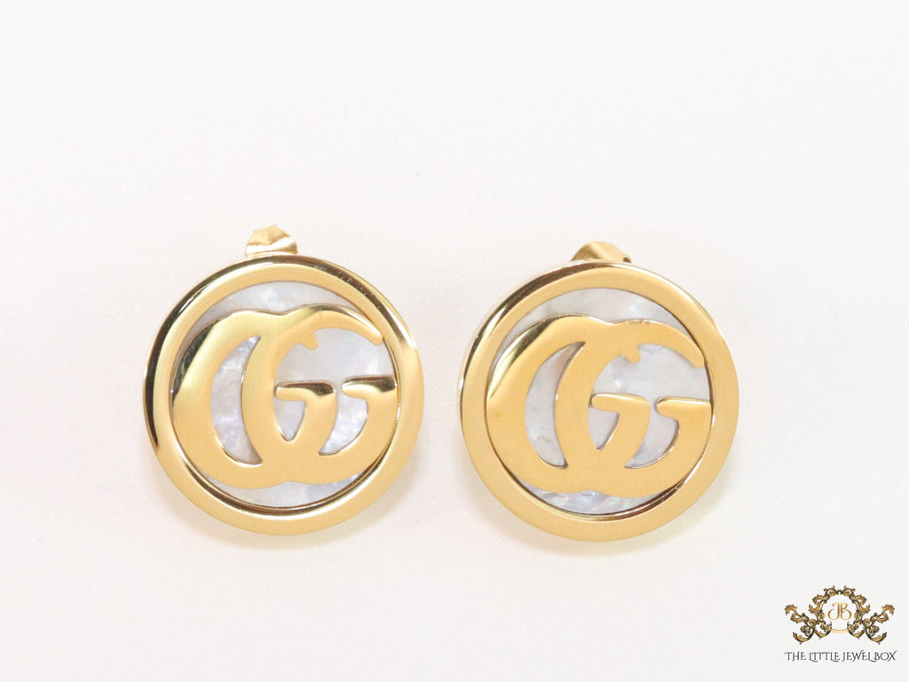 Gold plated twin G motif studs with MOP