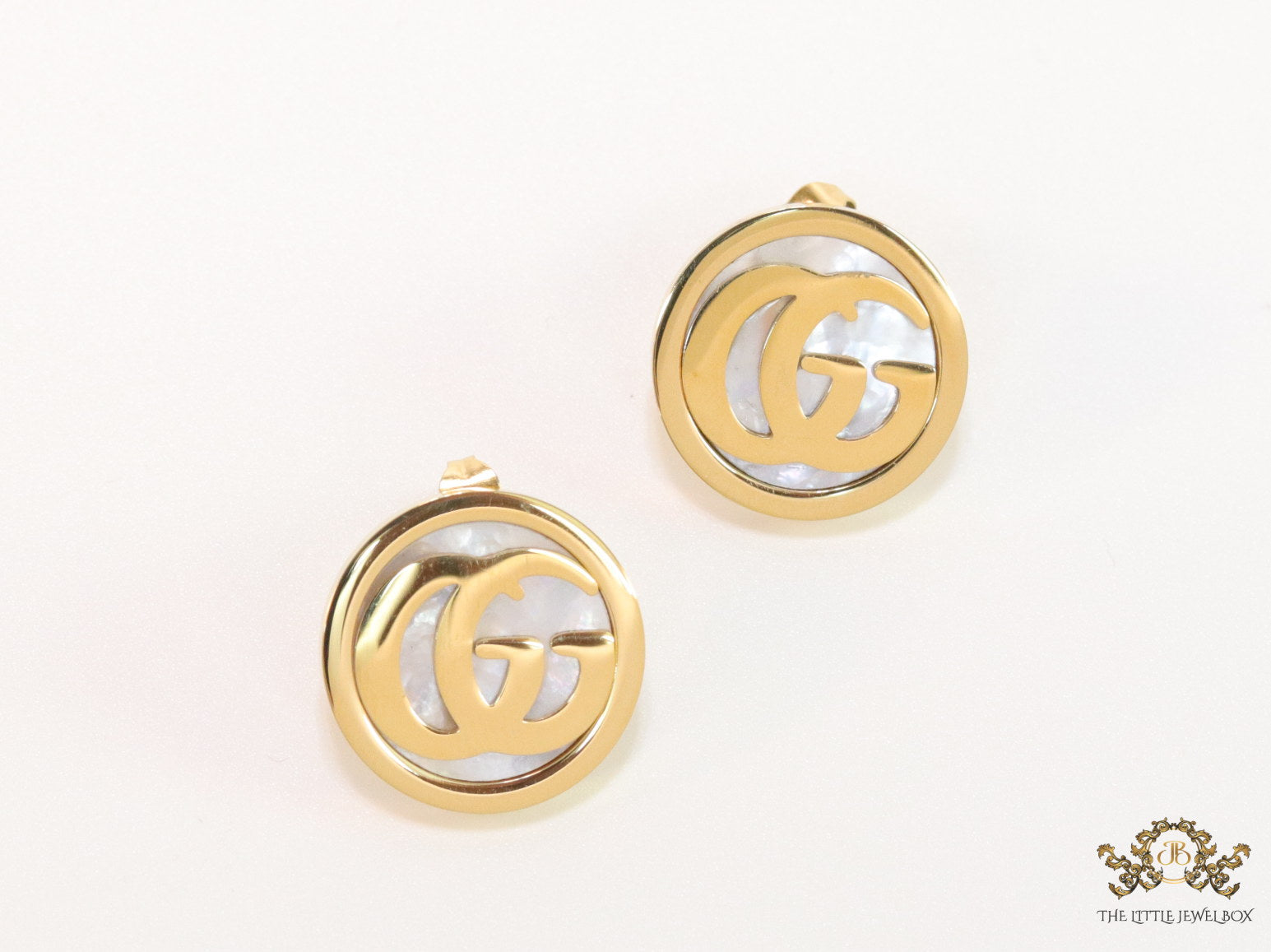 Gold plated twin G motif studs with MOP