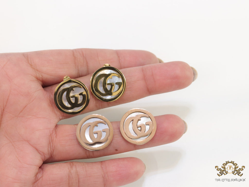 Rose gold plated twin G motif studs with MOP
