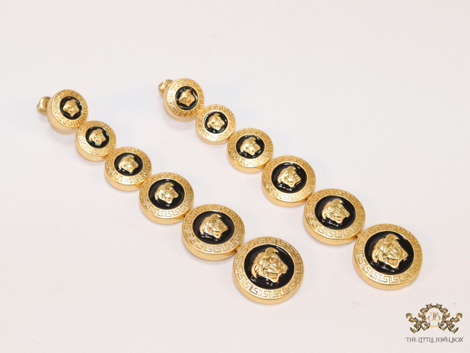 Golden and black long Medusa dangles