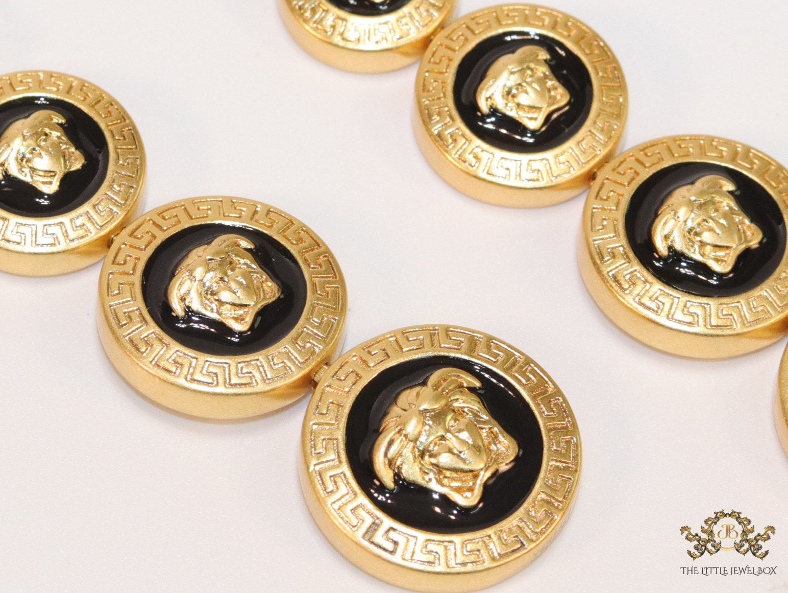 Golden and black long Medusa dangles