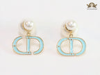 Pearl and aqua blue enamel CD bombers