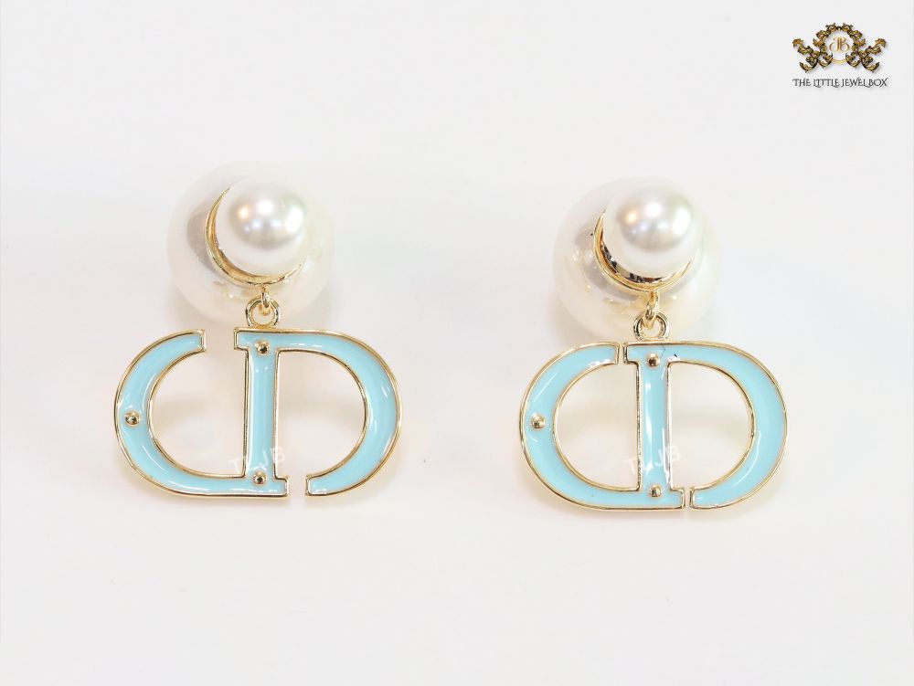 Pearl and aqua blue enamel CD bombers