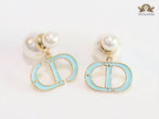 Pearl and aqua blue enamel CD bombers