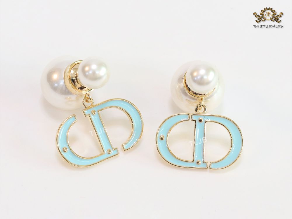 Pearl and aqua blue enamel CD bombers