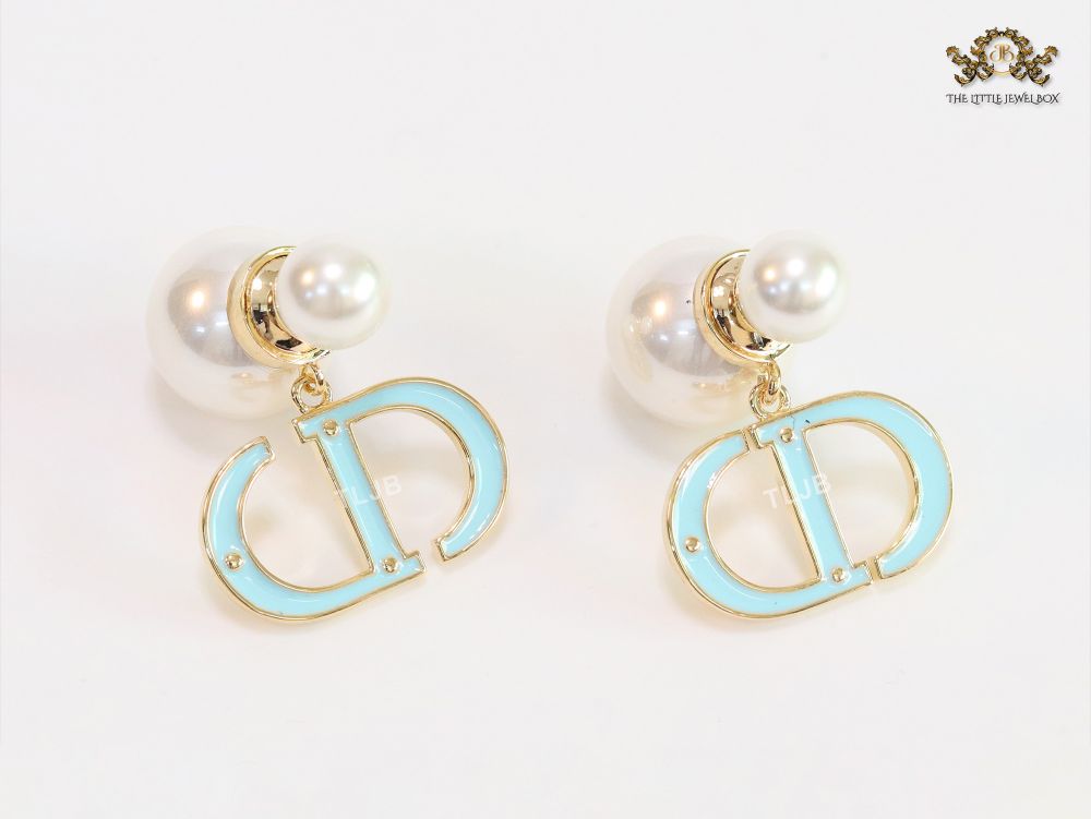 Pearl and aqua blue enamel CD bombers