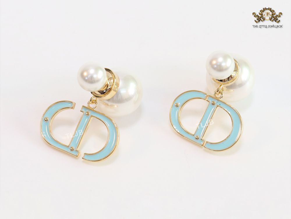 Pearl and aqua blue enamel CD bombers