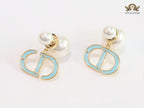 Pearl and aqua blue enamel CD bombers