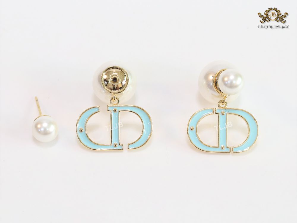 Pearl and aqua blue enamel CD bombers